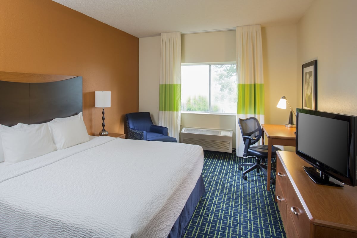 Pillow-top beds, desk, blackout curtains, iron/ironing board
