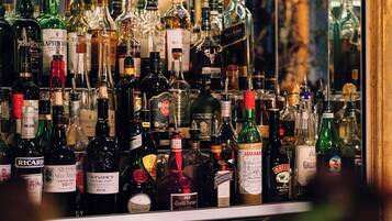 A bar stocked with various liquor bottles.