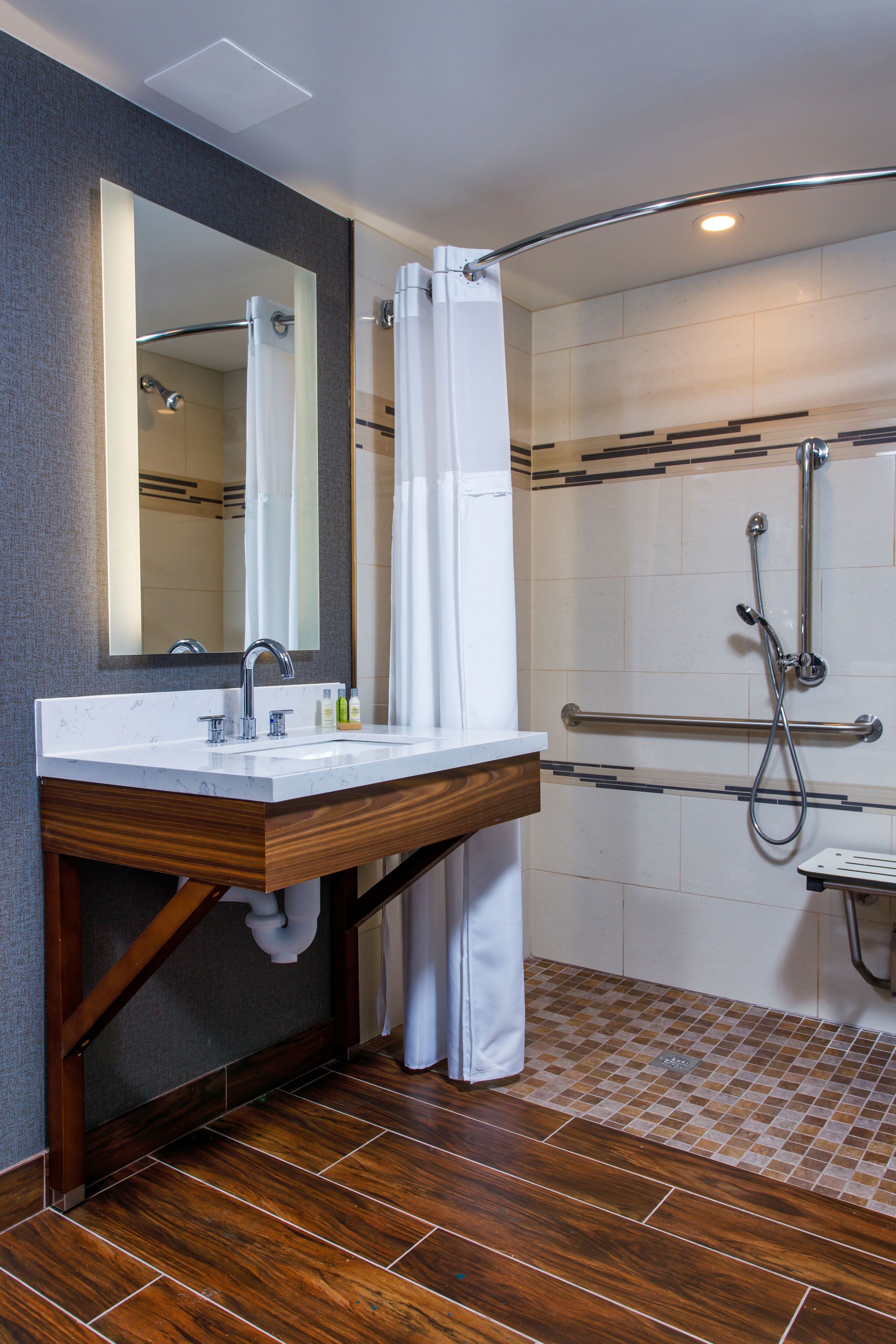 combined shower/bathtub, free toiletries, hair dryer, towels