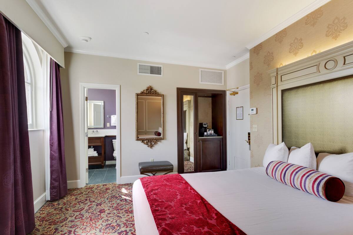Deluxe Room, 2 Queen Beds | In-room safe, desk, blackout drapes, iron/ironing board