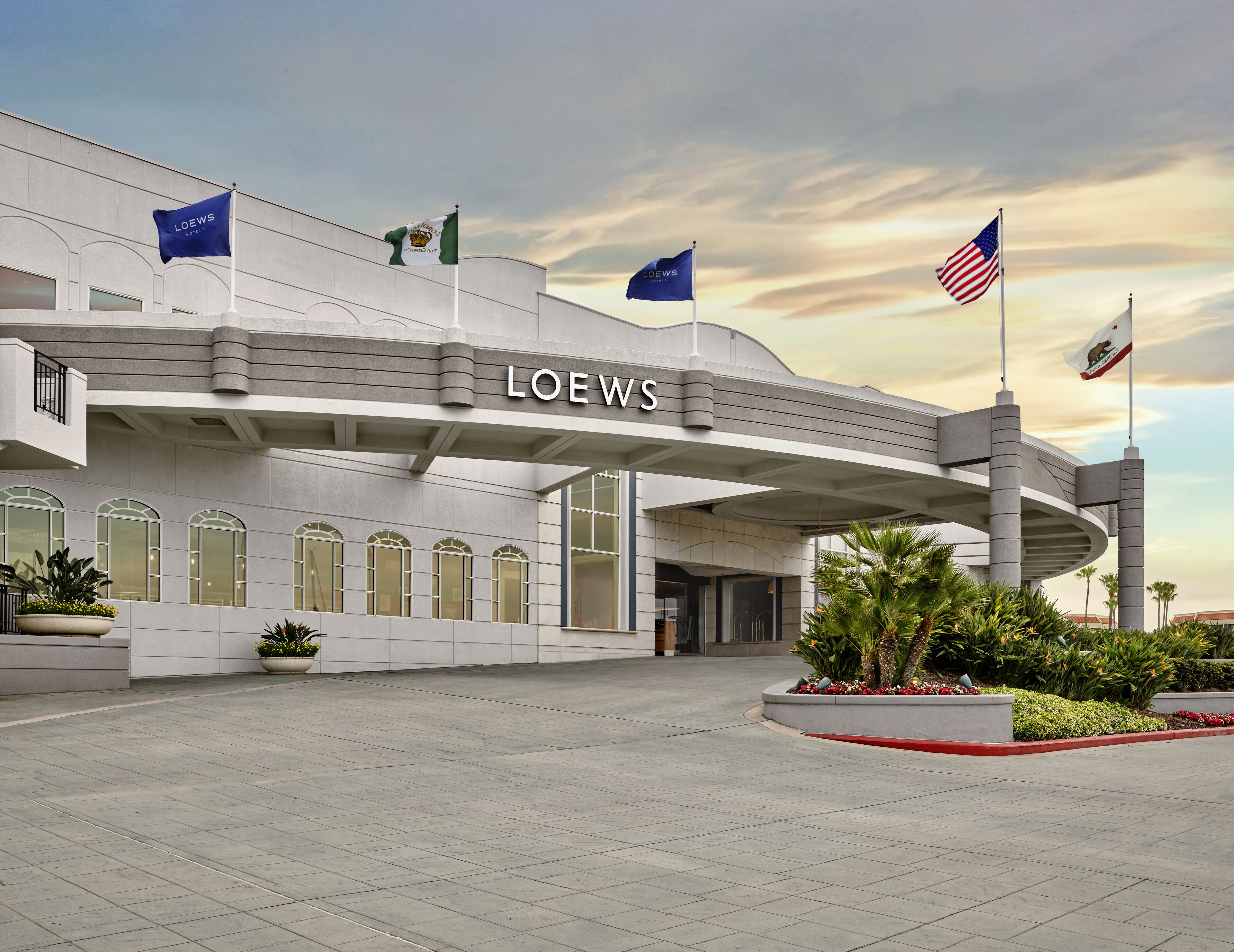 A hotel entrance with the name 'LOEWS' prominently displayed.