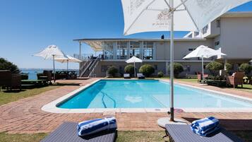Outdoor pool, open 6:00 AM to 9:30 PM, pool umbrellas, sun loungers