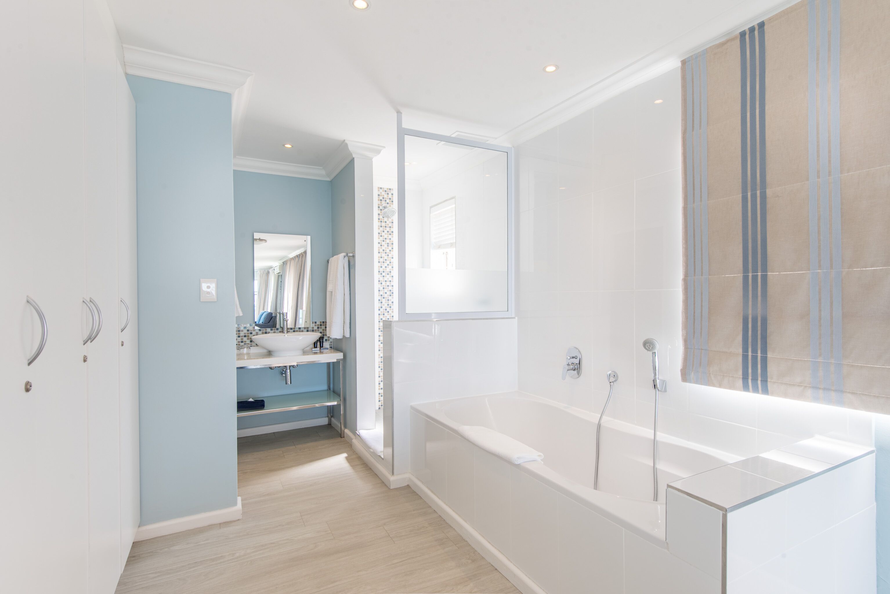 luxury studio suite | bathroom | free toiletries, hair dryer, towels, soap