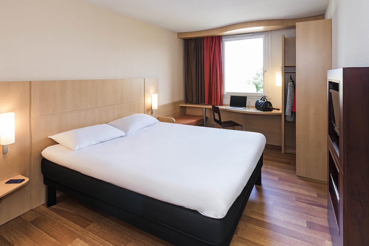 Desk, blackout curtains, iron/ironing board, free cots/infant beds