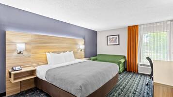 Standard Room, 1 King Bed, Non Smoking | In-room safe, desk, iron/ironing board, rollaway beds