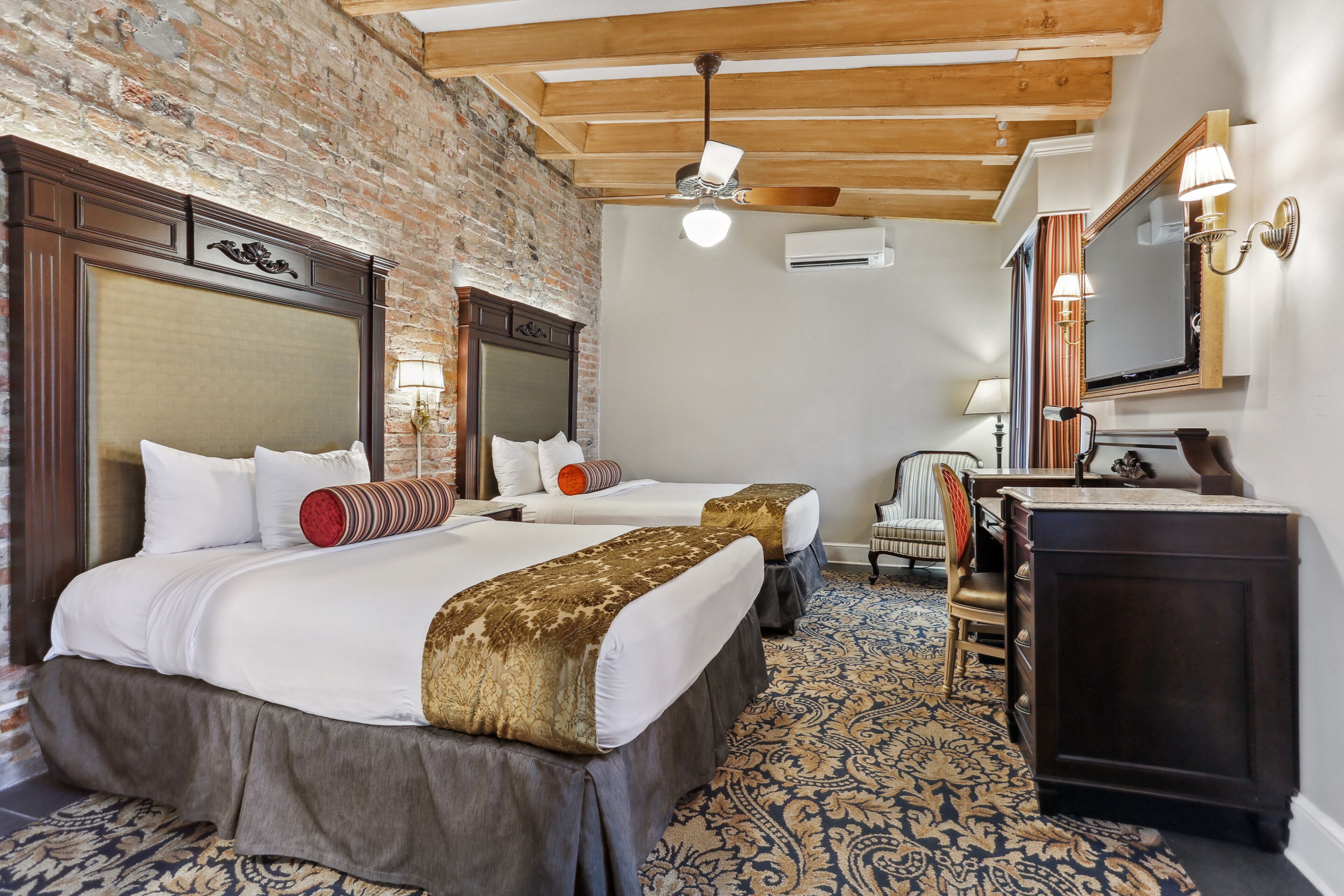 courtyard room, 2 queen beds | in-room safe, individually decorated, desk, blackout curtains