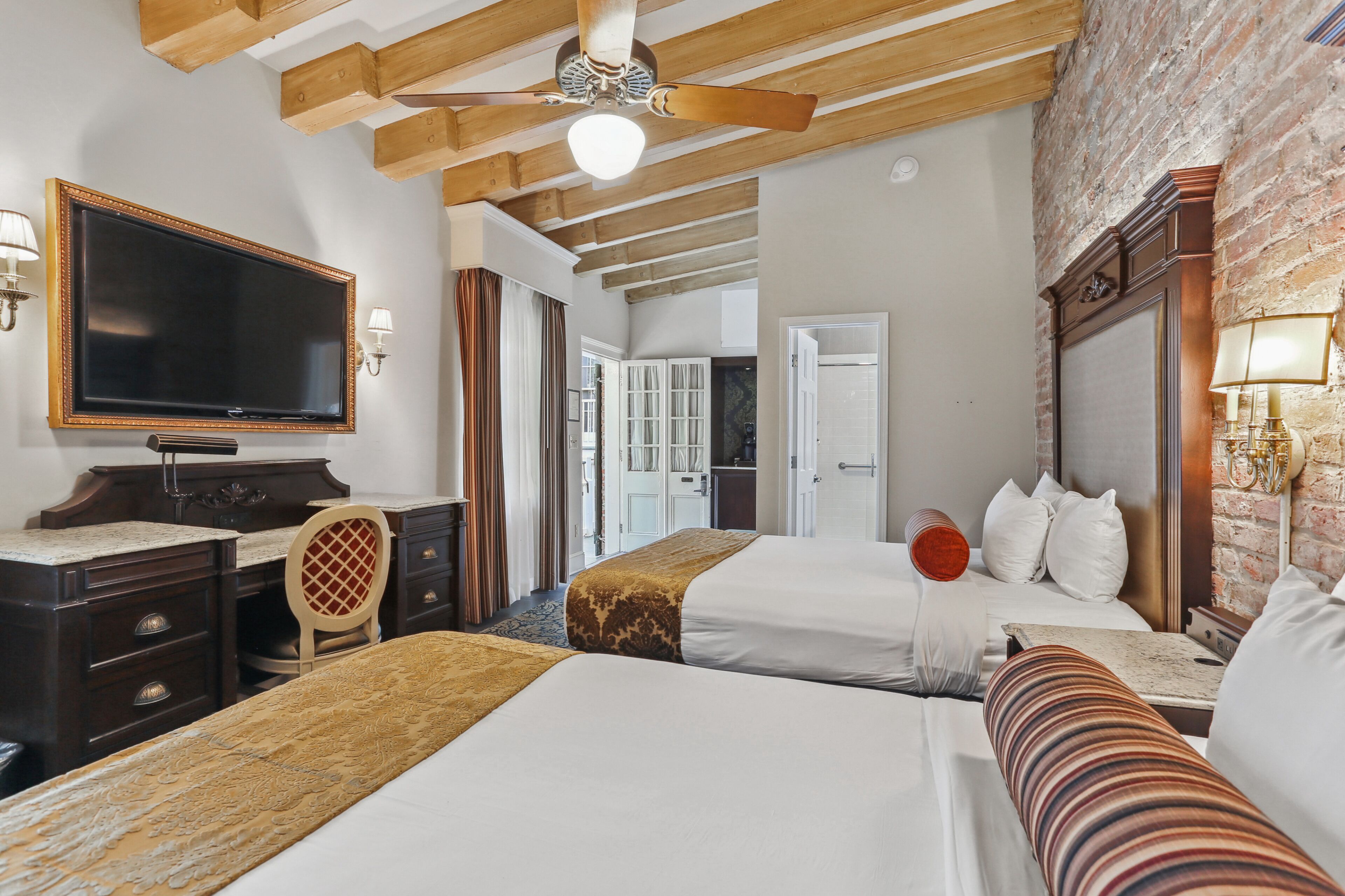 courtyard room, 2 queen beds | in-room safe, individually decorated, desk, blackout curtains