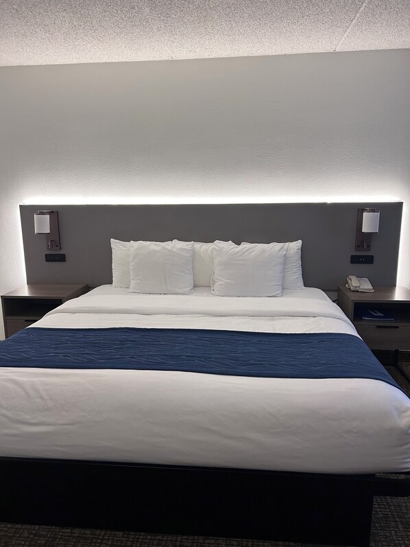 Premium bedding, pillow-top beds, desk, laptop workspace