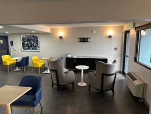 Relax in a stylish lounge with a variety of seating options and a contemporary design.