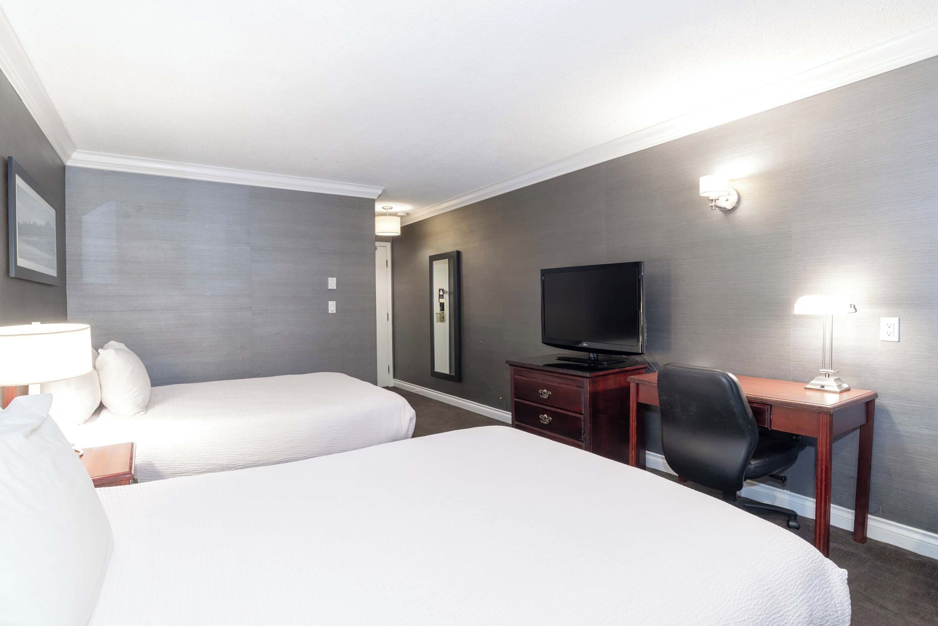 classic room, 2 queen beds (atrium building) | 1 bedroom, premium bedding, in-room safe, individually decorated
