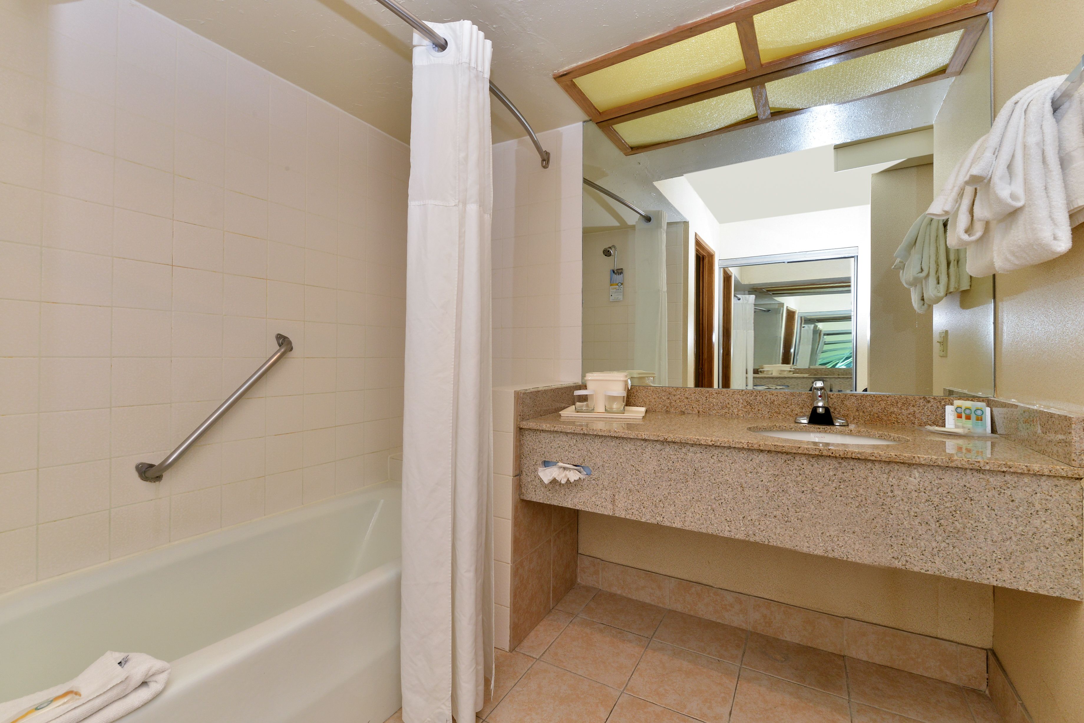 combined shower/bathtub, free toiletries, hair dryer, towels