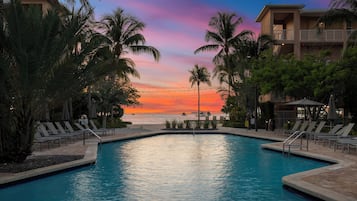 Outdoor pool, pool umbrellas, sun loungers