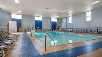 Indoor pool, open 6:00 AM to 11:00 PM, pool loungers