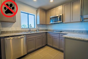 Family Apartment | Private kitchen | Fridge, microwave, stovetop, dishwasher