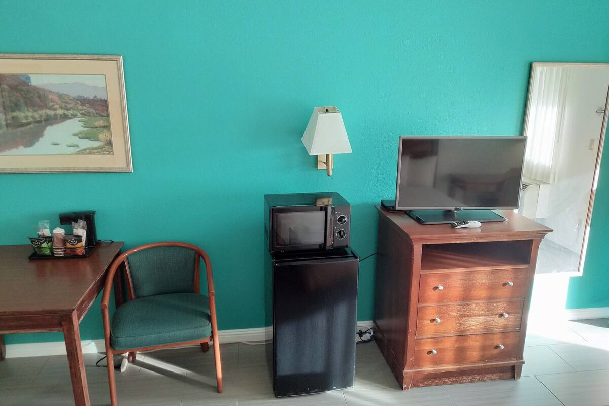 room, 2 queen beds, non smoking, refrigerator & microwave | 2 bedrooms, hypo-allergenic bedding, desk, blackout curtains