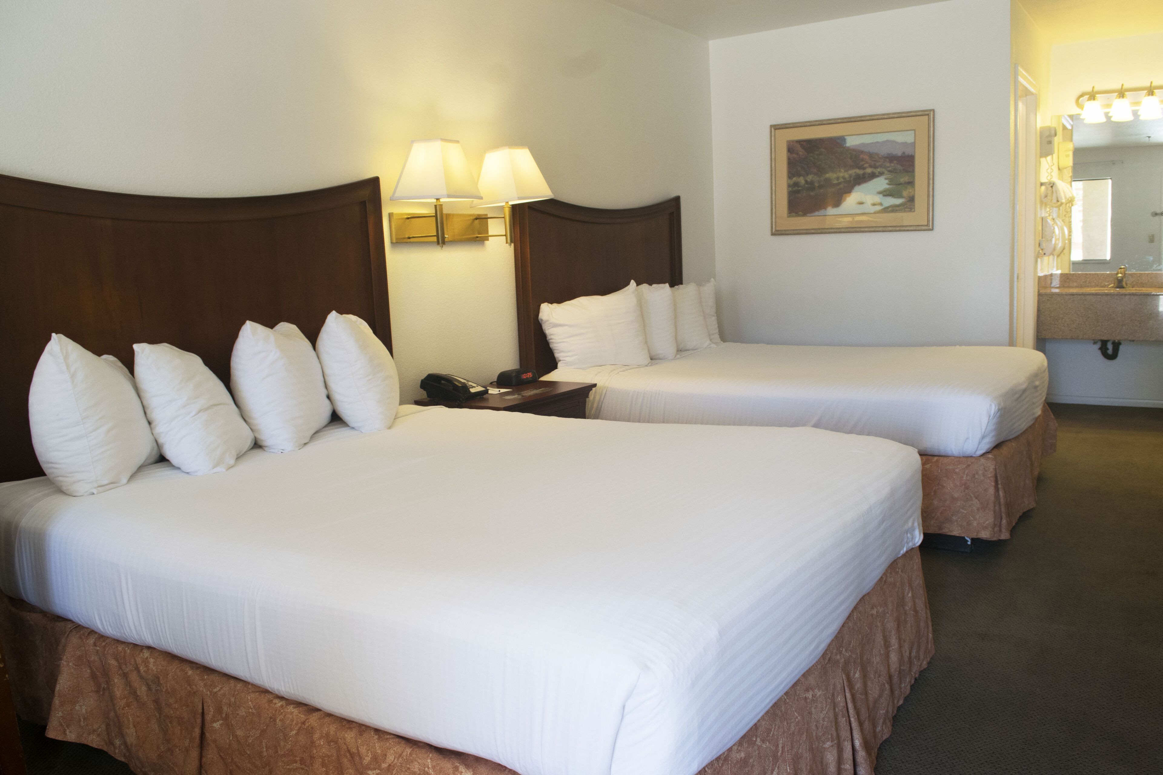 room, 2 queen beds, non smoking, refrigerator & microwave | 2 bedrooms, hypo-allergenic bedding, desk, blackout curtains