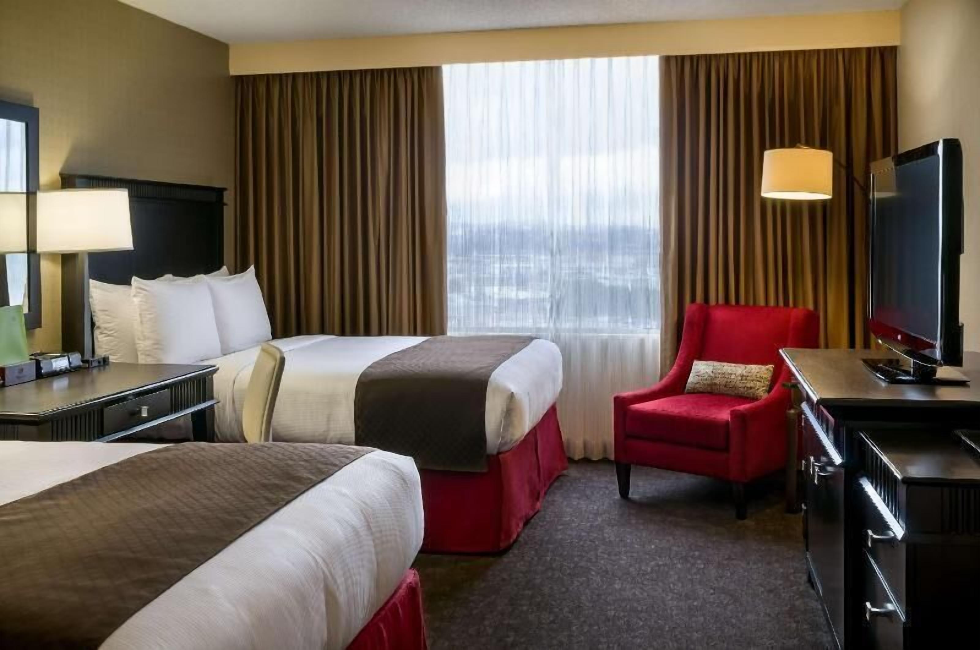 Premium bedding, down comforters, pillowtop beds, in-room safe