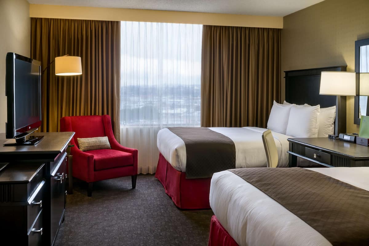 Premium bedding, down comforters, pillowtop beds, in-room safe