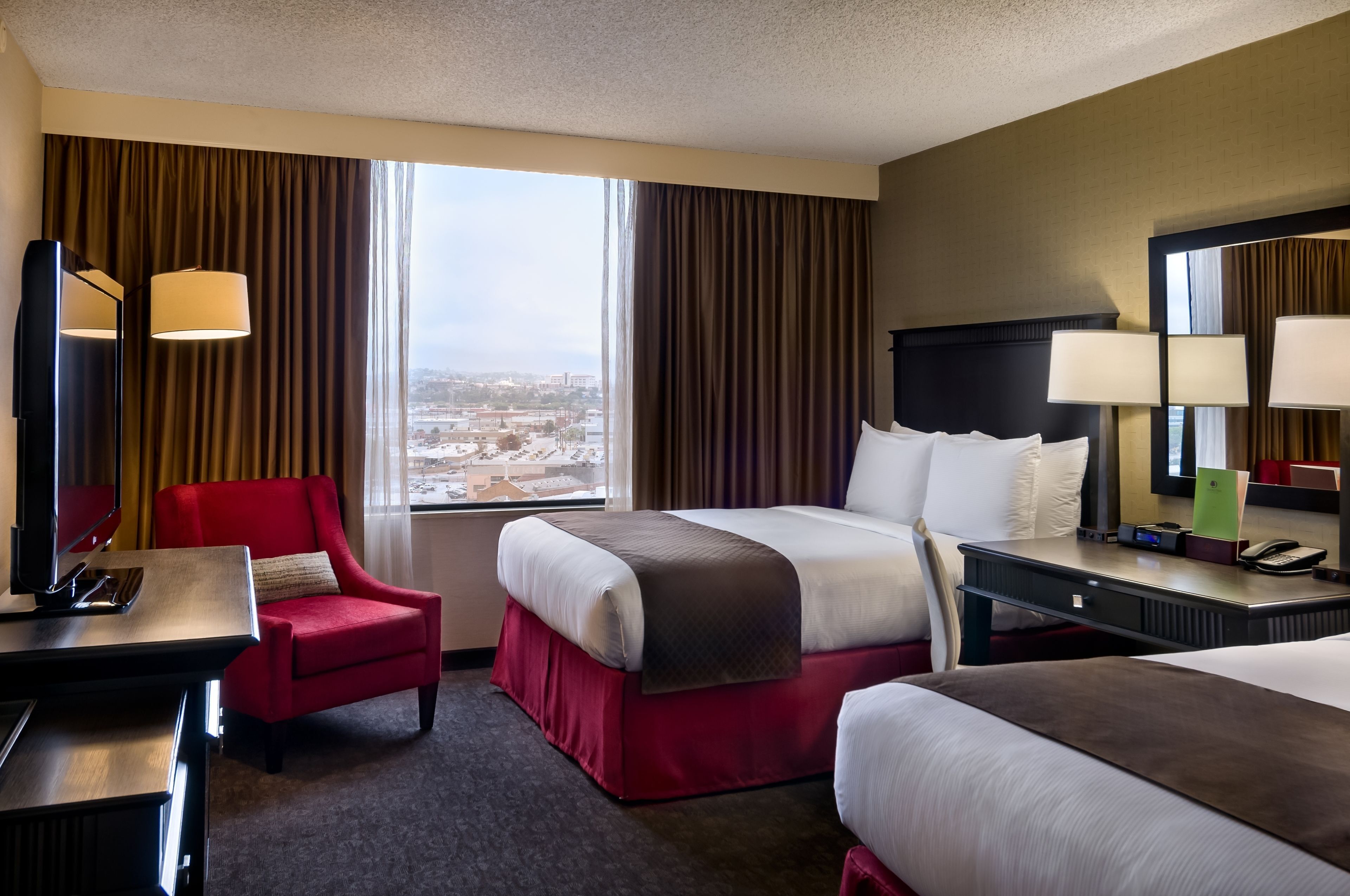Premium bedding, down comforters, pillowtop beds, in-room safe