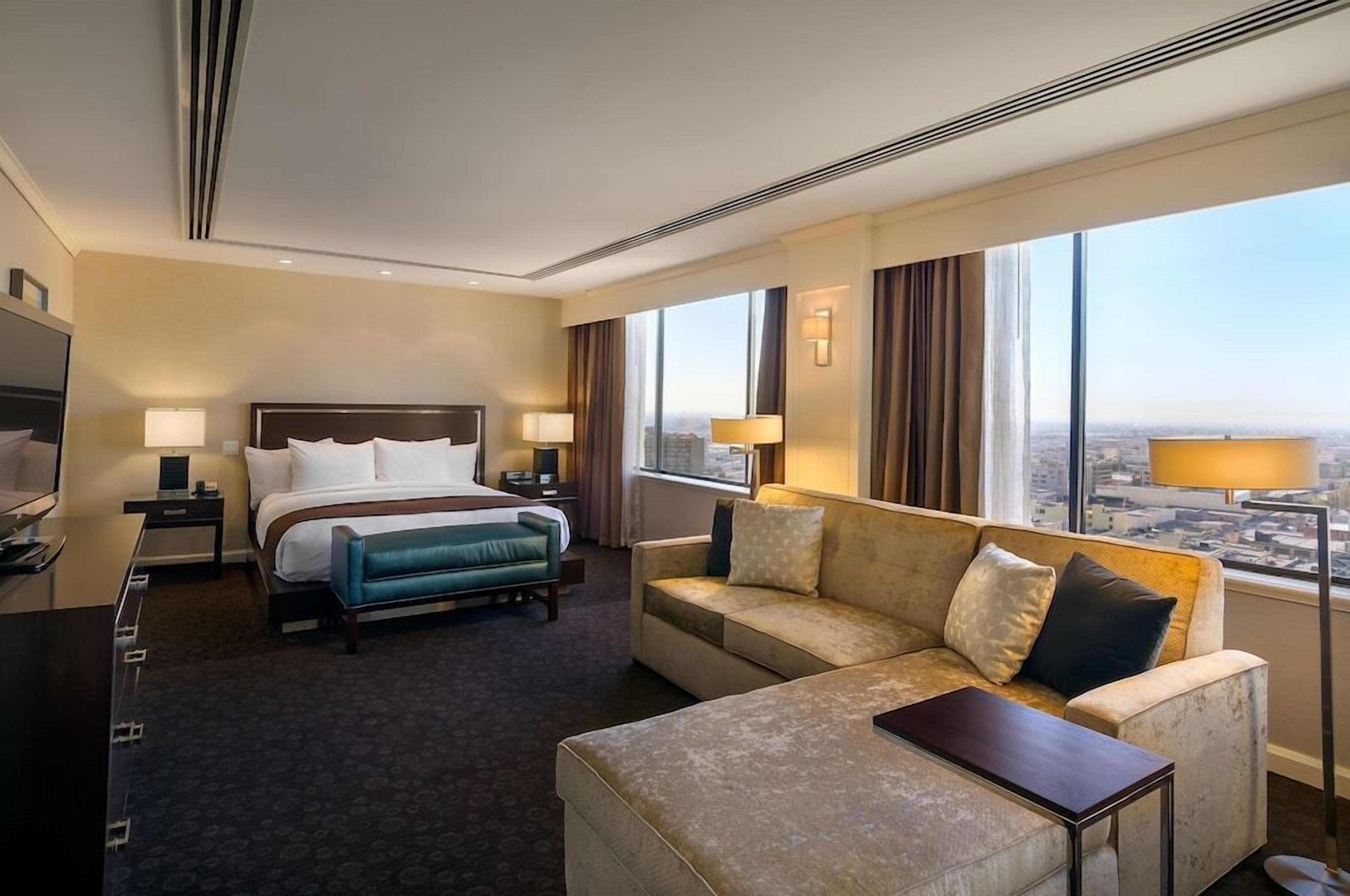 Premium bedding, down comforters, pillowtop beds, in-room safe