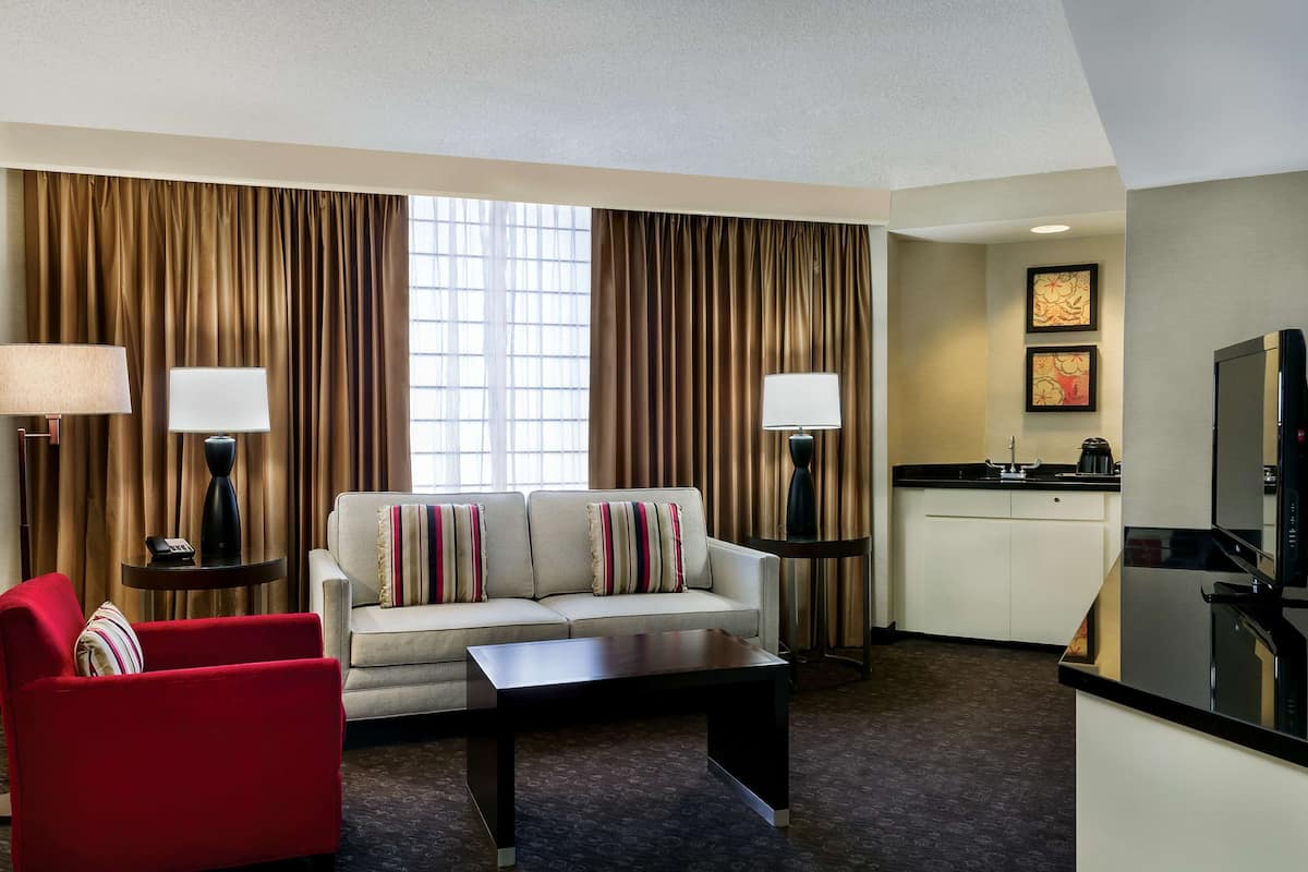 Suite, 1 King Bed, Non Smoking | Premium bedding, down comforters, pillowtop beds, in-room safe