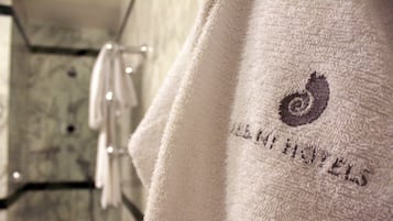 A white towel with a logo and the text "ALL INNOVATORS" on it.