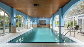 Indoor pool, open 7 AM to 9 PM, pool loungers