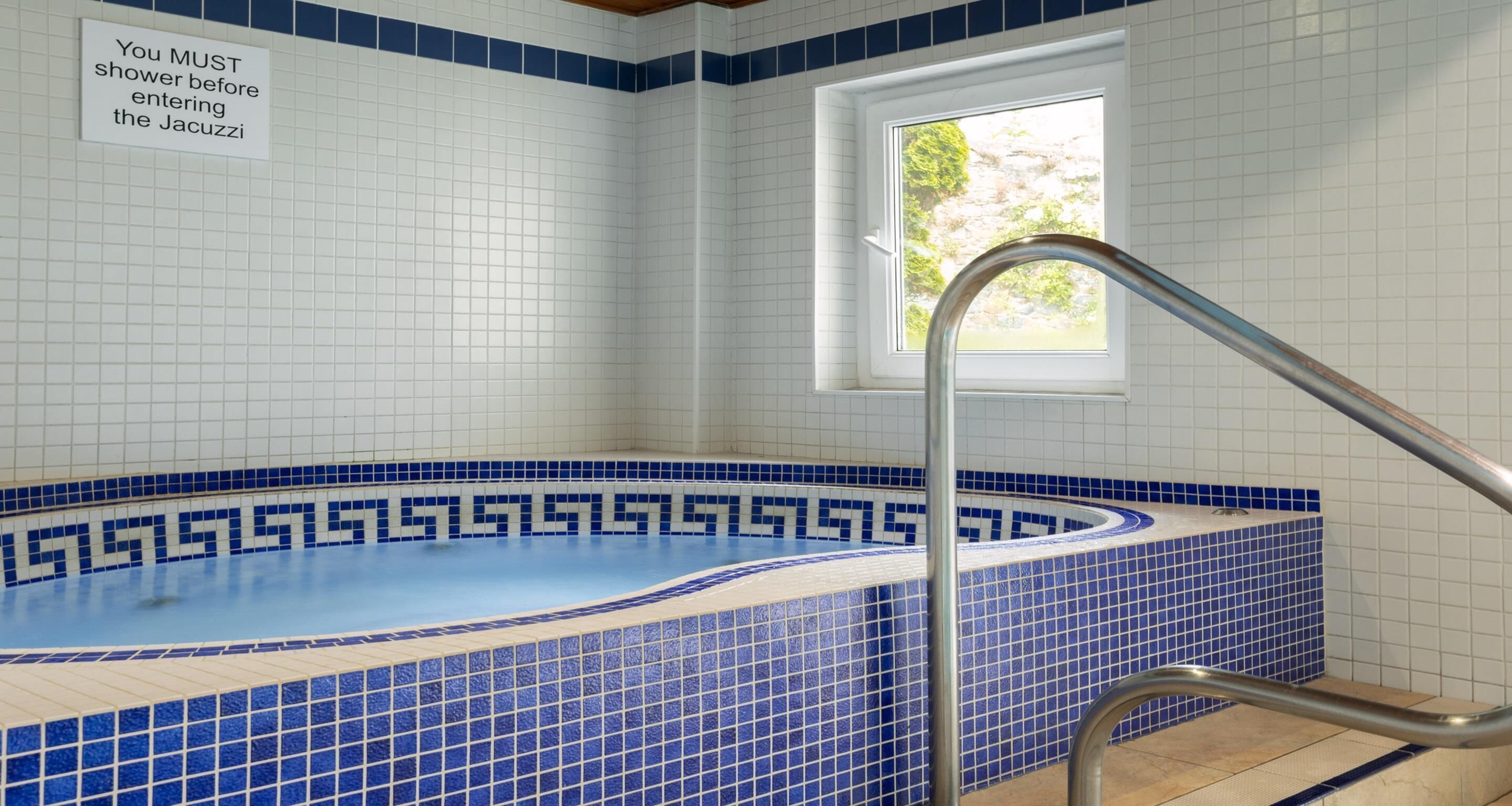 indoor pool, open 7 am to 9 pm, pool loungers