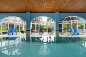 Indoor pool, open 7 AM to 9 PM, sun loungers