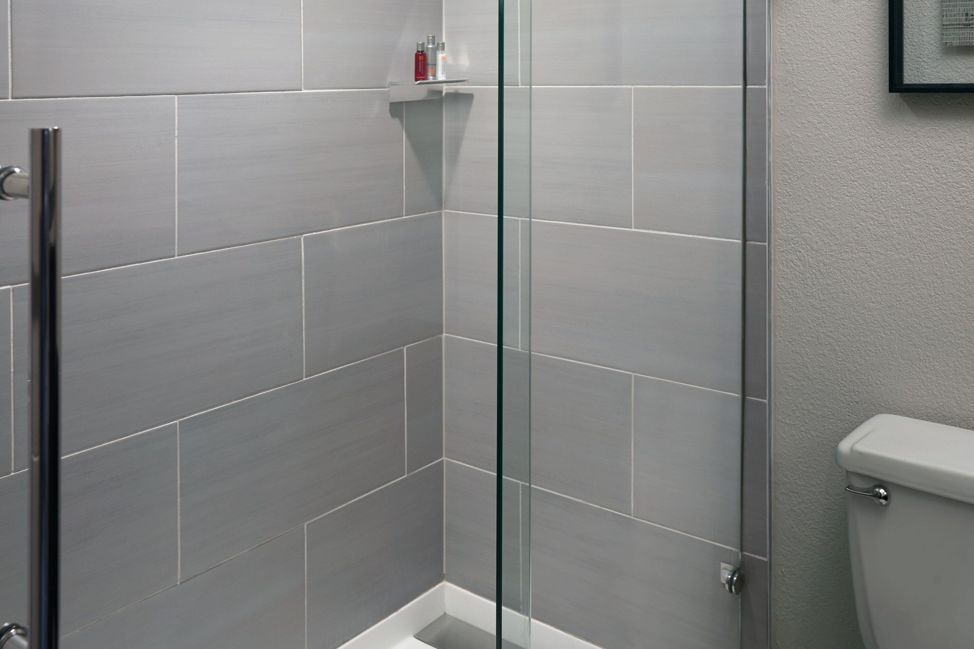 combined shower/bathtub, free toiletries, hair dryer, towels