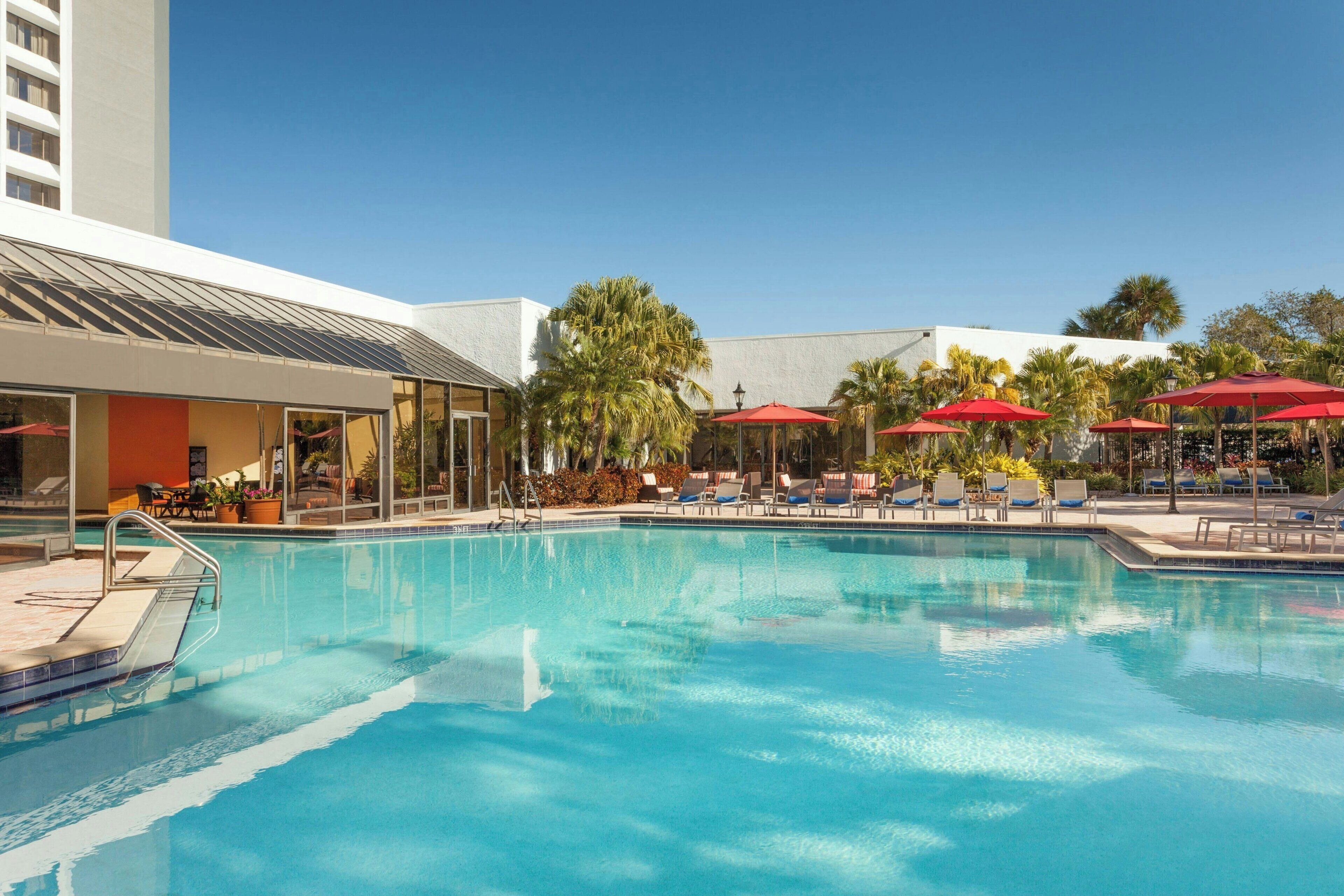 indoor pool, outdoor pool, open 7:00 am to 8:00 pm, pool umbrellas