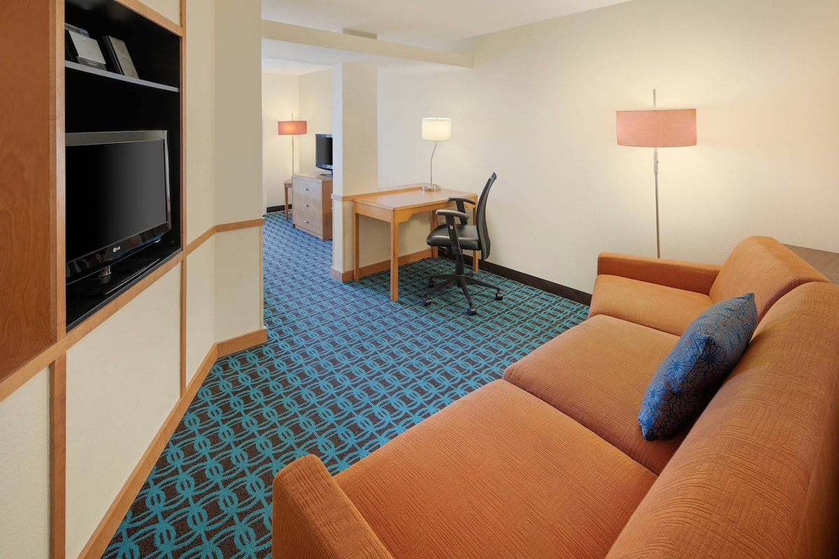 Suite, 1 King Bed with Sofa bed, Non Smoking | In-room safe, desk, laptop workspace, blackout drapes