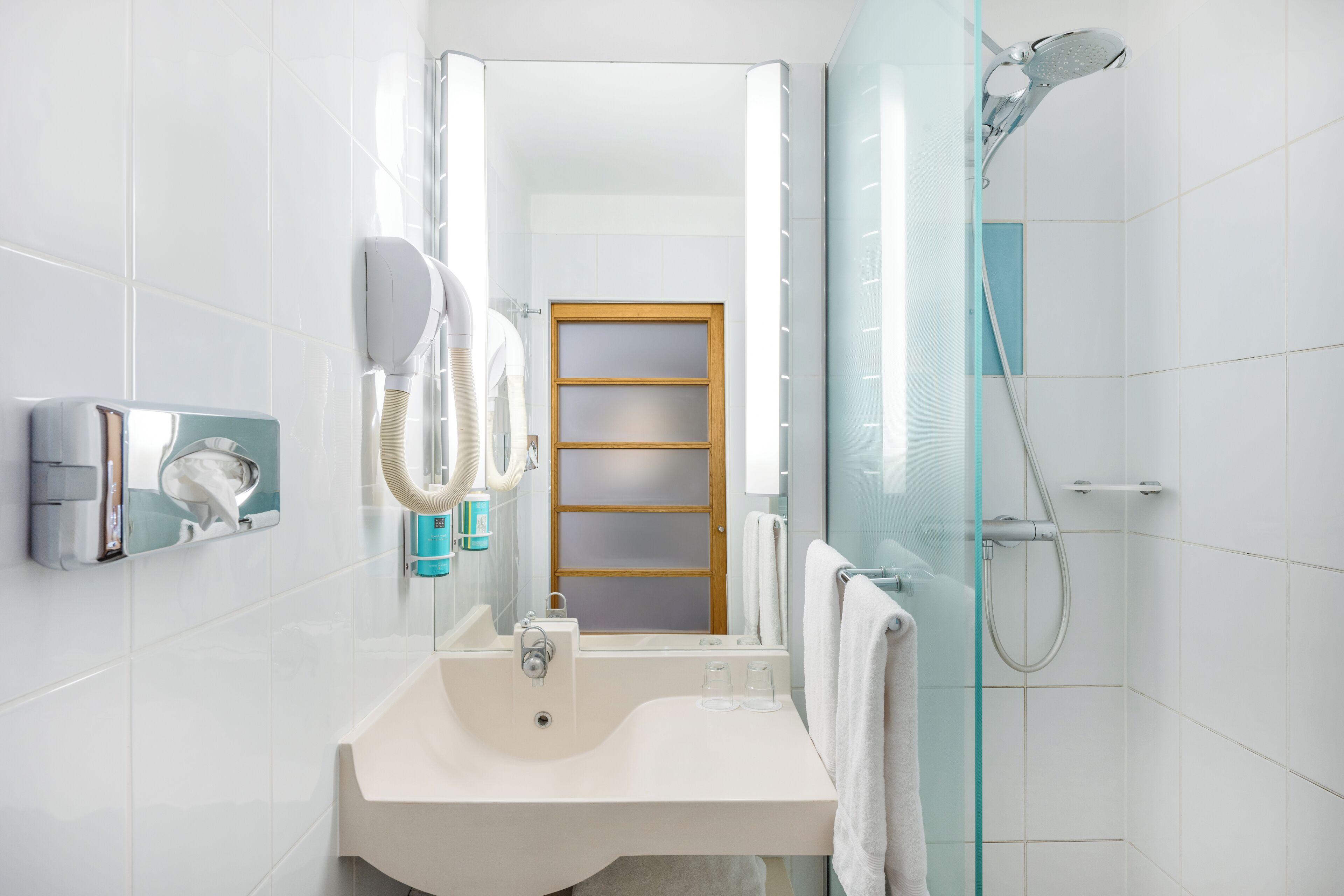 shower, eco-friendly toiletries, hair dryer, slippers