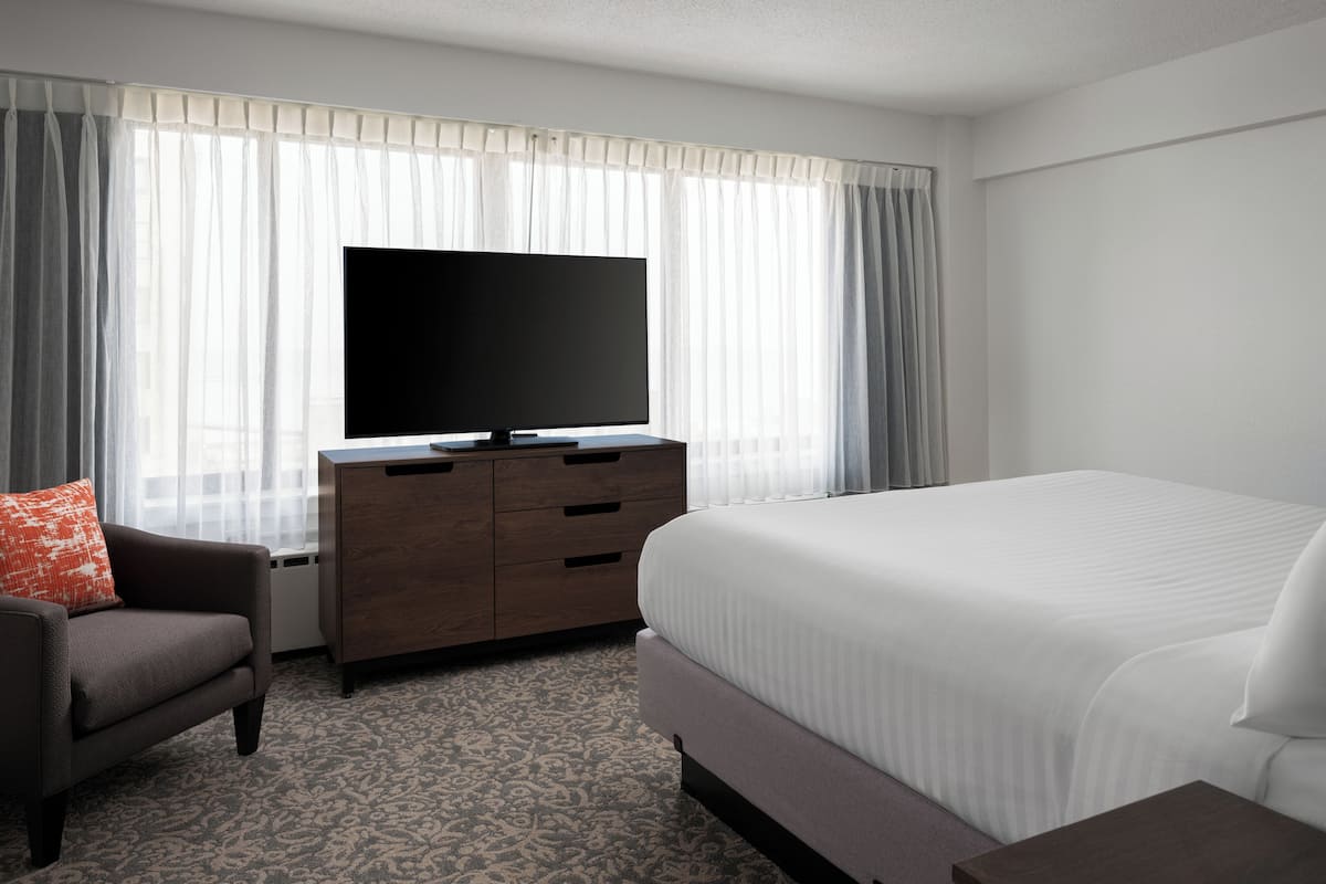 Hypo-allergenic bedding, pillowtop beds, desk, laptop workspace