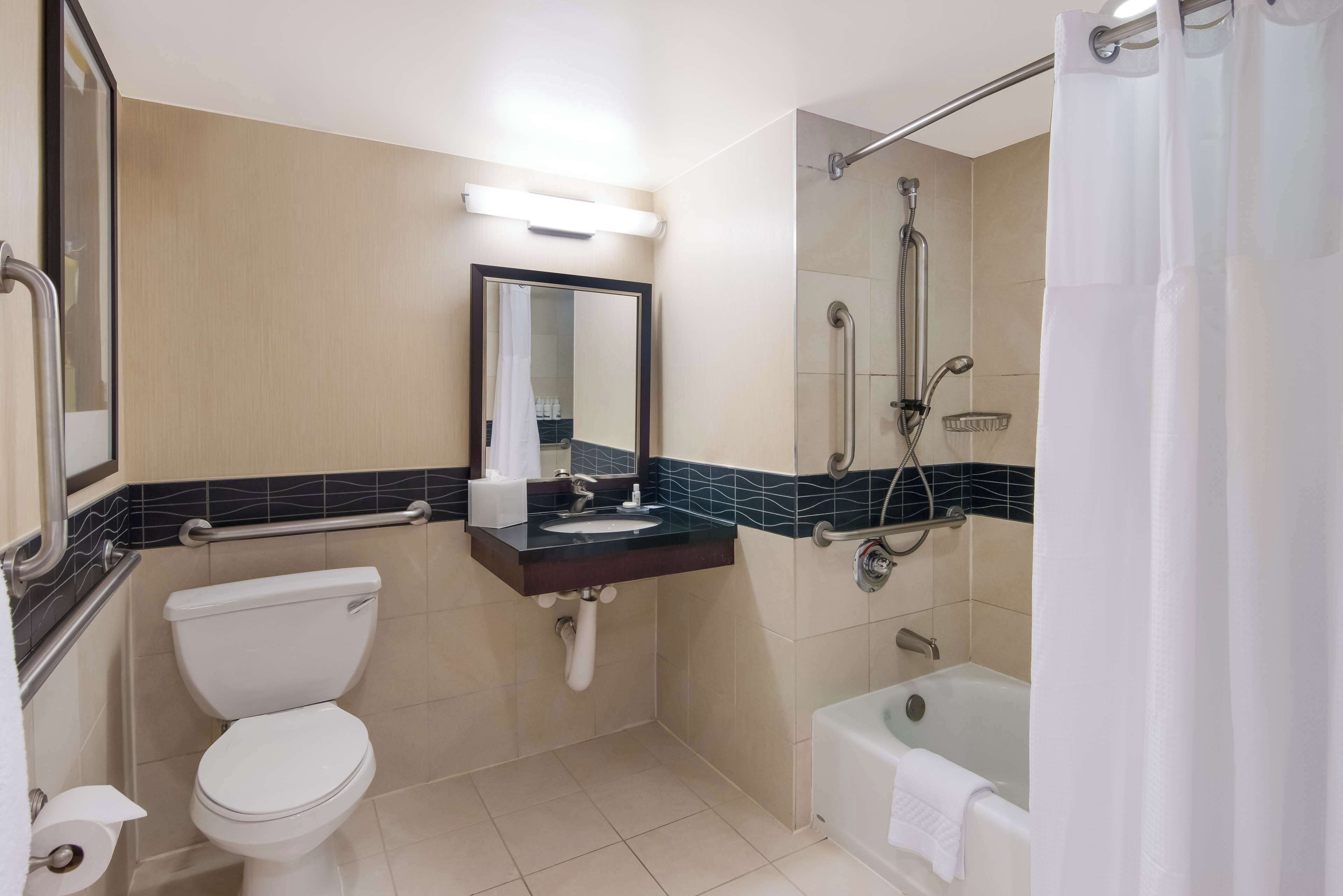 combined shower/bathtub, free toiletries, hair dryer, towels