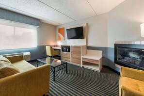 Suite, 1 King Bed, Non Smoking, Jetted Tub | Desk, laptop workspace, blackout drapes, rollaway beds