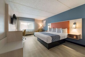 Desk, laptop workspace, blackout drapes, rollaway beds