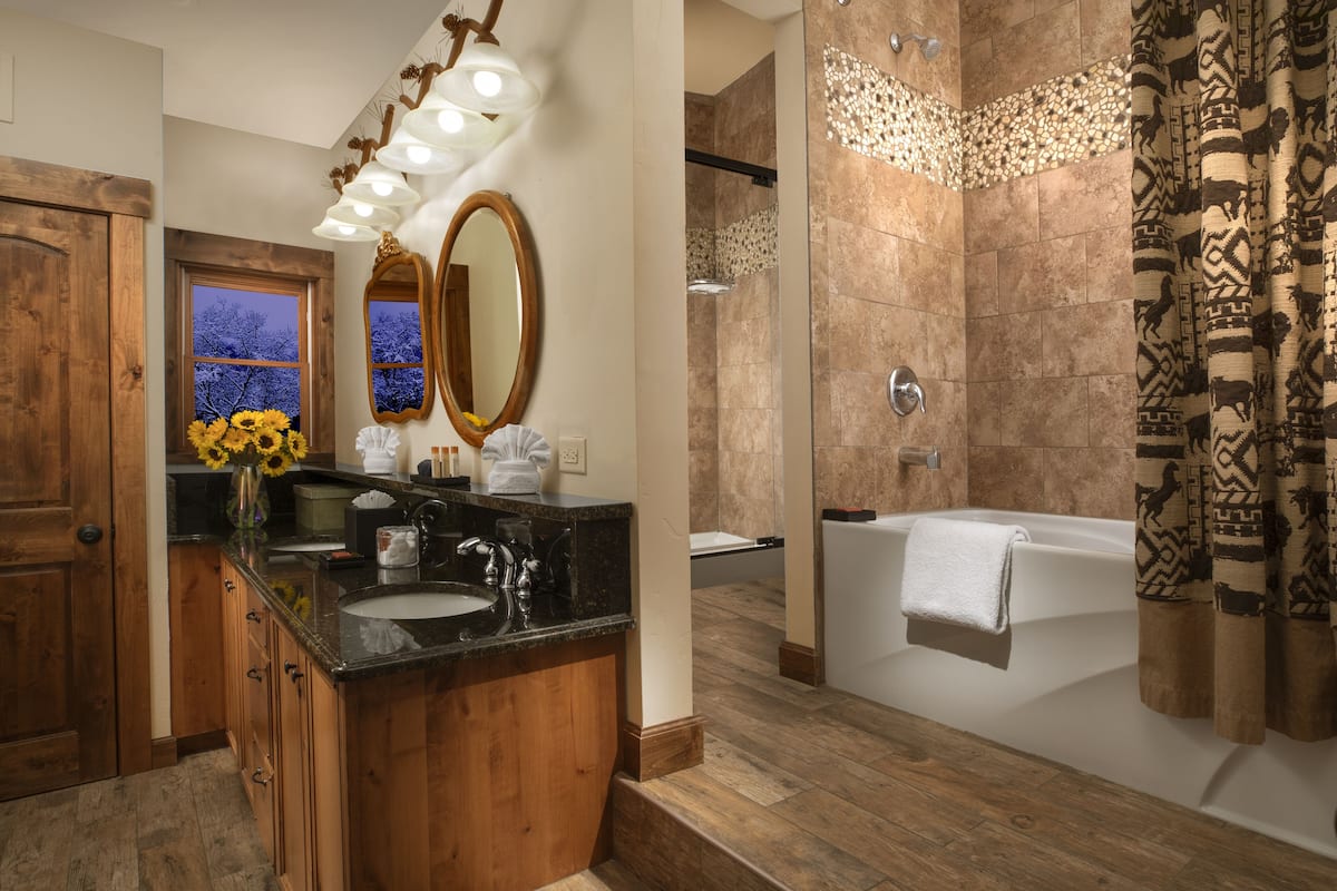 cottage master suite 53 | bathroom | designer toiletries, hair dryer, towels, soap