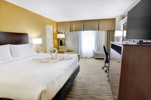 Suite, 1 King Bed | Desk, blackout drapes, iron/ironing board, cribs/infant beds