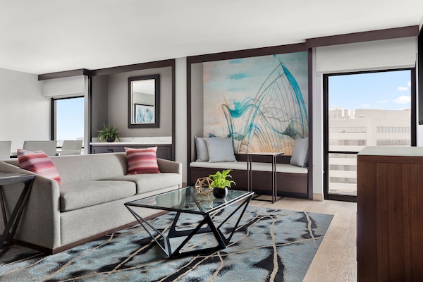 Premium bedding, down comforters, in-room safe, desk