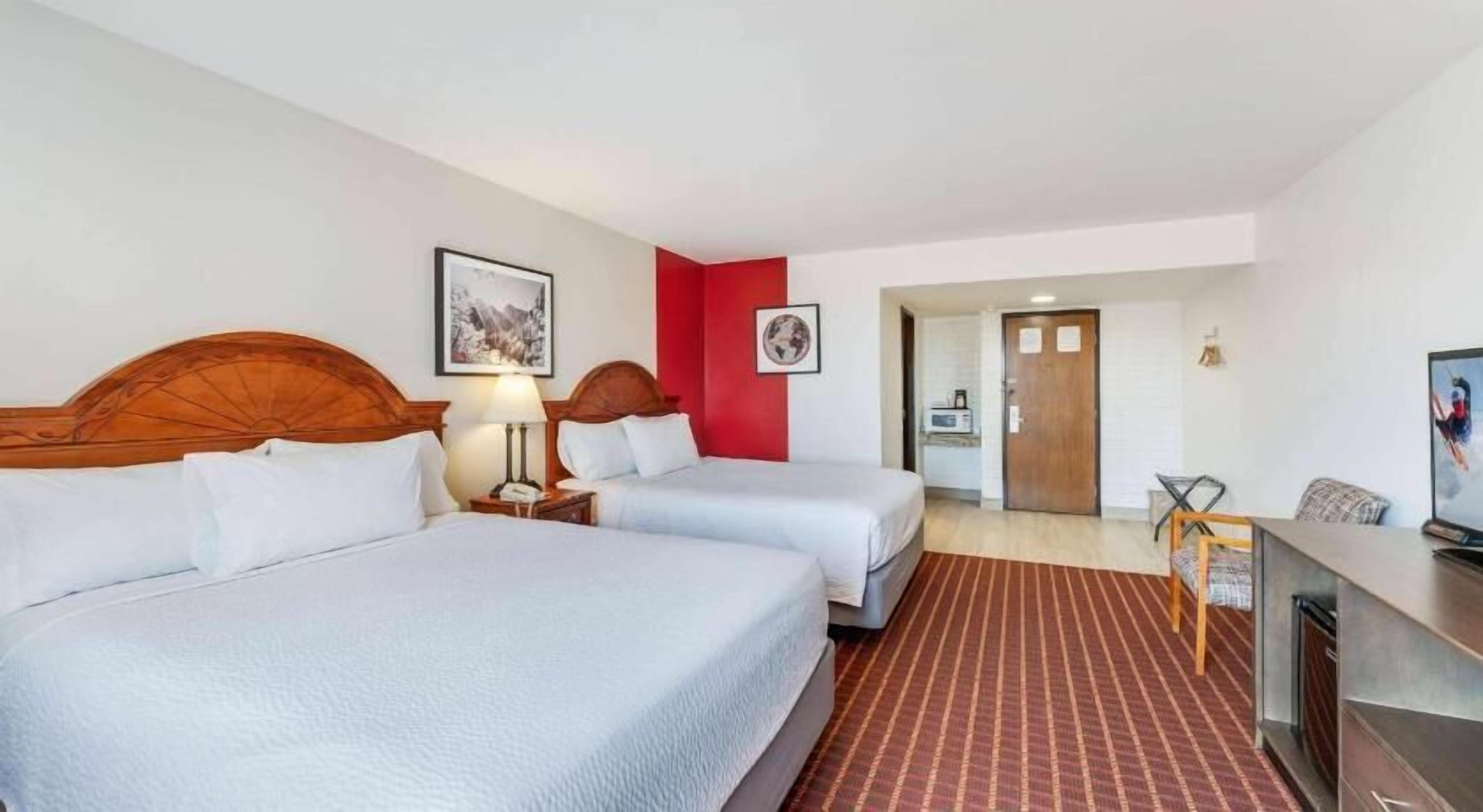 Premium bedding, desk, laptop workspace, blackout curtains
