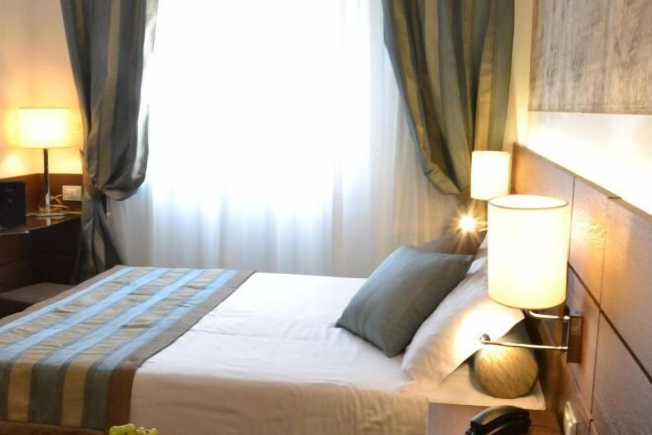 Premium bedding, down comforters, minibar, in-room safe