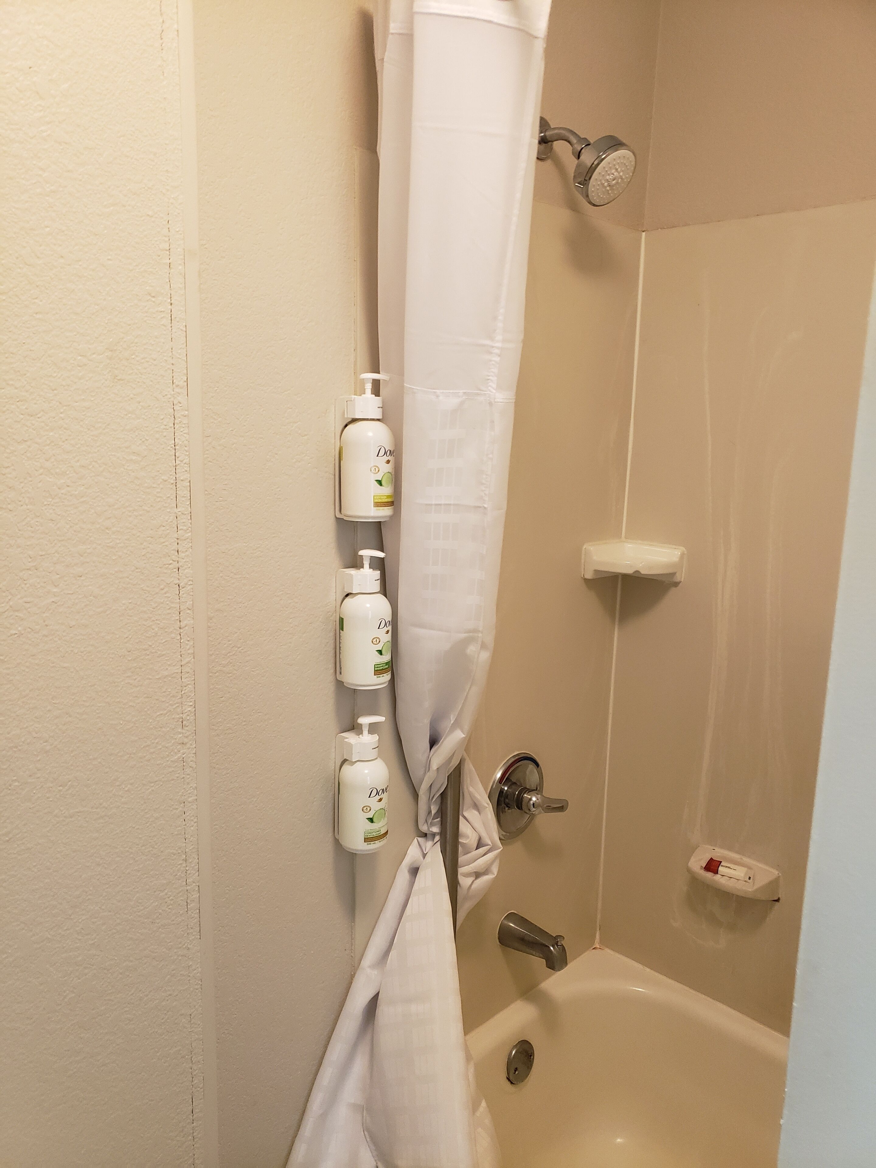 combined shower/bathtub, free toiletries, hair dryer, towels