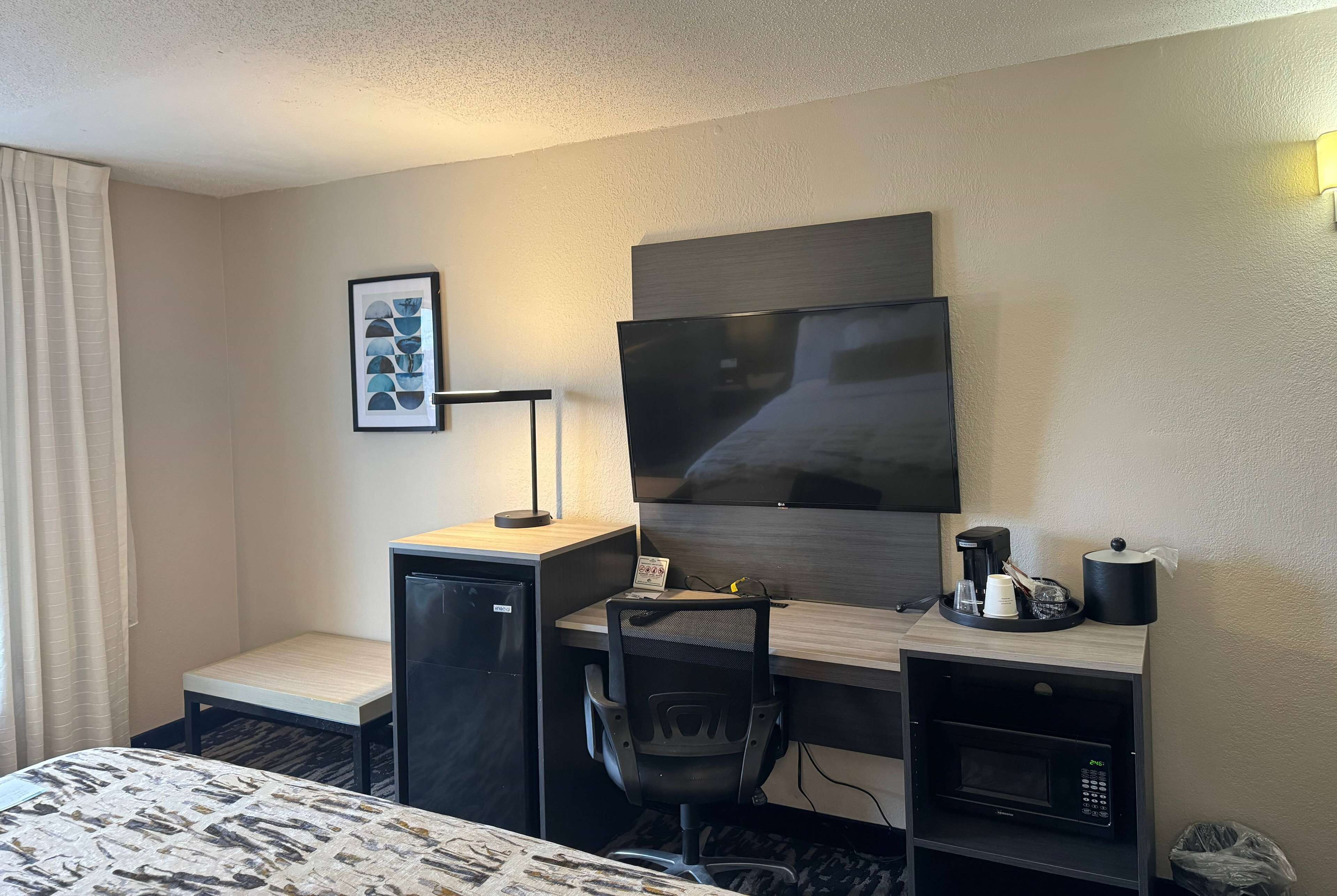 premium bedding, desk, laptop workspace, iron/ironing board