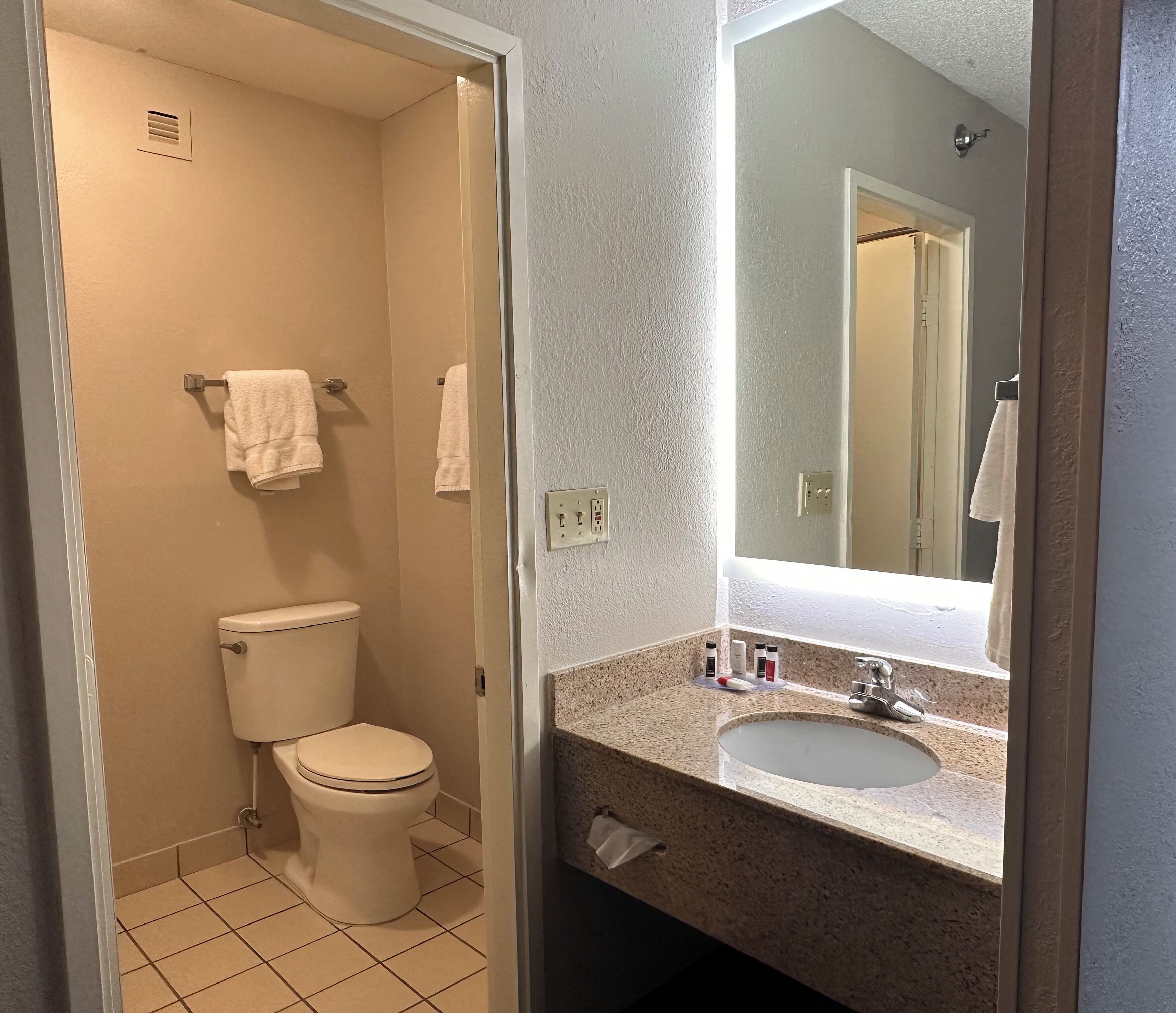 combined shower/bathtub, free toiletries, hair dryer, towels