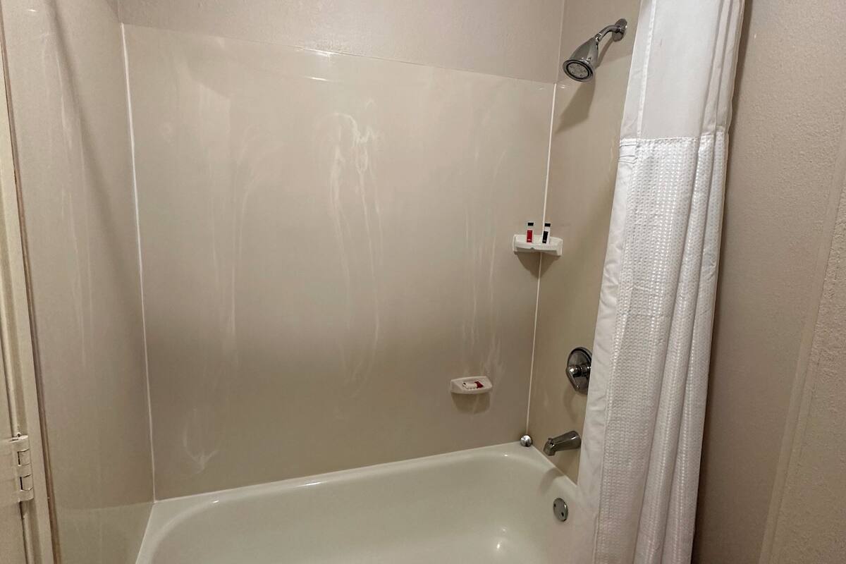 room, 2 double beds, non smoking | bathroom | combined shower/bathtub, free toiletries, hair dryer, towels