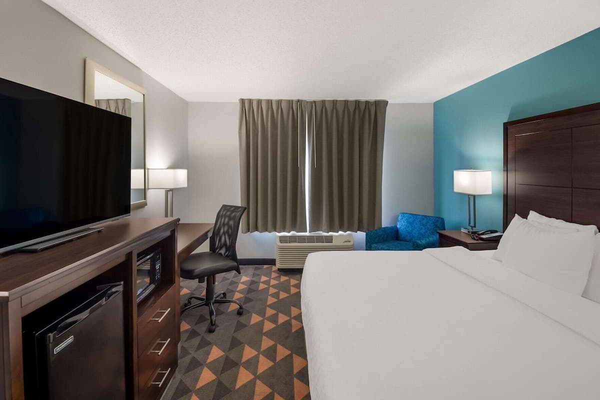 Minibar, desk, blackout drapes, iron/ironing board