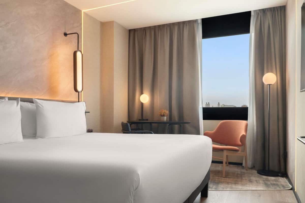 Rom – executive, 1 kingsize-seng | Minibar, lydisolert, wi-fi (inkludert) og sengetøy