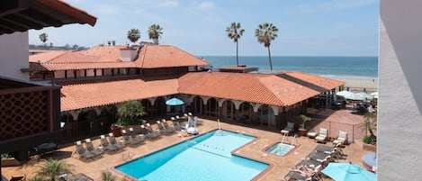 Outdoor pool, open 10:00 AM to 10:00 PM, pool umbrellas, pool loungers