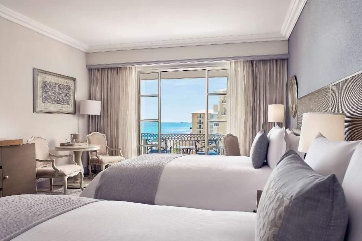 Premium bedding, down comforters, minibar, in-room safe